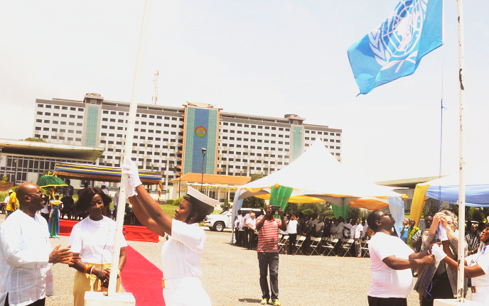  Ms Sherry Ayittey (2nd left), Minister of Fisheries and Aquaculture Development, Mr Ahmed Yakubu (left), Deputy Minister of Food and Agriculture, Mr Abebe Haile Gabriel (3rd right) of the FAO and Dr Christine Evans Klock  (2nd right), UN Resident Coordinator in Accra, jointly hoisting flags to mark World Food Day. Picture: Gabriel Ahiabor.